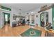 Spacious home office with wood floors, unique accents, and ample natural light at 12923 Colony Rd, Hudson, FL 34669