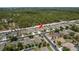 Overhead view of a home with lush green surroundings in a well-planned neighborhood at 13637 Blythewood Dr, Spring Hill, FL 34609