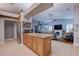 Open kitchen design with island, granite countertops and stainless steel appliances with view of Gathering room at 1416 Buckner Rd, Valrico, FL 33596