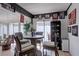 Cozy sunroom with wicker furniture, a small table, and a mini fridge at 1416 Buckner Rd, Valrico, FL 33596
