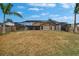 Expansive backyard with a screened lanai offers plenty of space for outdoor activities and entertaining guests at 1601 Westerly Dr, Brandon, FL 33511