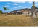 Spacious backyard features a screened enclosure, perfect for outdoor living and enjoying the Florida sunshine at 1601 Westerly Dr, Brandon, FL 33511