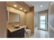 Bathroom featuring a vessel sink, a framed mirror, and recessed lighting at 1601 Westerly Dr, Brandon, FL 33511