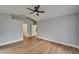 Spacious bedroom features tile floors, neutral paint, vaulted ceiling, and modern ceiling fan at 1601 Westerly Dr, Brandon, FL 33511