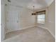 Bright dining area with tile flooring, a hanging light fixture, and natural light from the window at 1601 Westerly Dr, Brandon, FL 33511