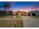 Charming single-Gathering home featuring mature landscaping, a two-car garage, and a welcoming front yard at 1601 Westerly Dr, Brandon, FL 33511
