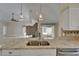 Bright kitchen featuring granite countertops, stainless steel appliances, and modern pendant lighting at 1601 Westerly Dr, Brandon, FL 33511