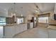 Spacious kitchen with stainless steel appliances, breakfast bar, and pool view at 1601 Westerly Dr, Brandon, FL 33511