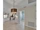 The kitchen area boasts white cabinets, stainless steel appliances, and tile flooring at 1601 Westerly Dr, Brandon, FL 33511