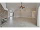 Open living room with front door, fireplace, and tile floors at 1601 Westerly Dr, Brandon, FL 33511