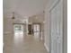 Open-concept living area with tile floors, fireplace, and sliding glass doors leading to the pool at 1601 Westerly Dr, Brandon, FL 33511