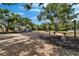 Scenic park includes swings and playground under the shade of mature trees at 1601 Westerly Dr, Brandon, FL 33511