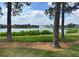 Scenic pond view with a fountain, lush greenery, and a picturesque residential backdrop at 1601 Westerly Dr, Brandon, FL 33511