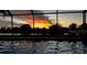 Screened pool offers stunning sunset view and relaxing space at 1601 Westerly Dr, Brandon, FL 33511