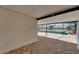 View of the screened pool and lake from the covered lanai at 1601 Westerly Dr, Brandon, FL 33511
