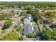 High aerial shot of the property's location in a tranquil neighborhood with mature trees at 16605 Round Oak Dr, Tampa, FL 33618