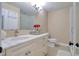 Charming bathroom features a white vanity with marble countertop and glass shower at 16605 Round Oak Dr, Tampa, FL 33618