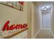 Hallway displaying tiled floor and modern style at 16605 Round Oak Dr, Tampa, FL 33618