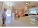 Inviting entrance with tile flooring, a stylish chandelier, and an open view into the dining and living areas at 16605 Round Oak Dr, Tampa, FL 33618