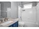 Bathroom featuring vanity, sink, toilet, tub, and shower at 1755 Open Field Loop, Brandon, FL 33510