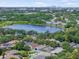 Aerial view of the community and lake with city skyline visible in the distance at 1924 Sean Wood Cir, Brandon, FL 33510