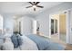 Bedroom with a sliding glass doors to the outside, ceiling fan, and modern decor at 1924 Sean Wood Cir, Brandon, FL 33510