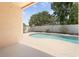 View of the pool in the backyard with white fencing surrounding the area at 1924 Sean Wood Cir, Brandon, FL 33510