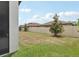 Fenced backyard featuring manicured landscaping and a lush lawn, perfect for outdoor enjoyment at 21746 Amelia Rose Way, Land O Lakes, FL 34637