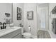 Neutral bathroom with a stylish vanity, featuring modern fixtures and ample cabinet space at 21746 Amelia Rose Way, Land O Lakes, FL 34637
