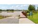 Community lake access with boat ramp and dock for residents, providing recreational opportunities at 21746 Amelia Rose Way, Land O Lakes, FL 34637