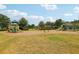 Community playground with swings and slides, offering fun for residents of all ages at 21746 Amelia Rose Way, Land O Lakes, FL 34637