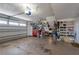 Spacious garage with storage, tool chest, and overhead lighting providing functionality at 2202 Donato Dr, Belleair Beach, FL 33786