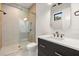 Contemporary bathroom showcasing a glass shower, modern vanity, and sleek fixtures at 2218 S Occident St, Tampa, FL 33629