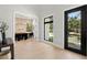 Foyer view showing dining room with modern lighting and front window at 2218 S Occident St, Tampa, FL 33629