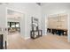 Open foyer showcasing living room and dining room with elegant hardwood floors and modern decor at 2218 S Occident St, Tampa, FL 33629