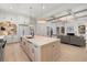 Open kitchen layout with a large center island and seamless access to the living room at 2218 S Occident St, Tampa, FL 33629