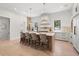 Bright kitchen features a large island with seating and pendant lighting at 2218 S Occident St, Tampa, FL 33629