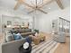 Open-concept living room with hardwood floors and access to kitchen at 2218 S Occident St, Tampa, FL 33629