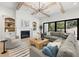 Bright living room with fireplace and coffered ceilings at 2218 S Occident St, Tampa, FL 33629