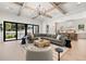 Bright and open living space with hardwood floors and access to the kitchen at 2218 S Occident St, Tampa, FL 33629