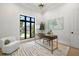 Airy office featuring a stylish desk, large window, and comfortable seating for a productive workspace at 2218 S Occident St, Tampa, FL 33629