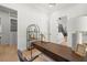 Bright office with a dark wood desk, modern decor, and an open view to the staircase at 2218 S Occident St, Tampa, FL 33629