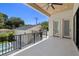 This patio offers a ceiling fan and an outdoor view of the grill, pool and garage area at 2218 S Occident St, Tampa, FL 33629
