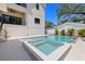 This backyard features an in-ground pool with spa, mature trees and plenty of outdoor space at 2218 S Occident St, Tampa, FL 33629