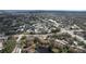 Expansive aerial view of a residential area, featuring a mix of buildings, trees, and roadways at 2679 Sabal Springs Cir # 102, Clearwater, FL 33761
