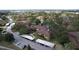 Aerial view of the condo complex with covered parking and mature trees surrounding the buildings at 2679 Sabal Springs Cir # 102, Clearwater, FL 33761