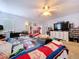 Comfortable main bedroom with a ceiling fan, spacious closet, and views of the surrounding areas at 2679 Sabal Springs Cir # 102, Clearwater, FL 33761