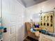 A peek inside the entryway with seating, decor, and a glimpse into the dining area at 2679 Sabal Springs Cir # 102, Clearwater, FL 33761