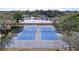 Outdoor community tennis courts fenced in and well maintained at 2679 Sabal Springs Cir # 102, Clearwater, FL 33761