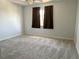 Bedroom featuring carpet floors, a window, and neutral walls at 2820 Pankaw Ln, Valrico, FL 33596